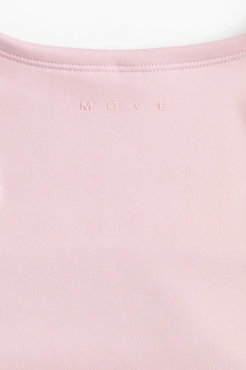 اتش اند ام بلوزة رياضية بأكمام طويلة من نسيج دراي موف